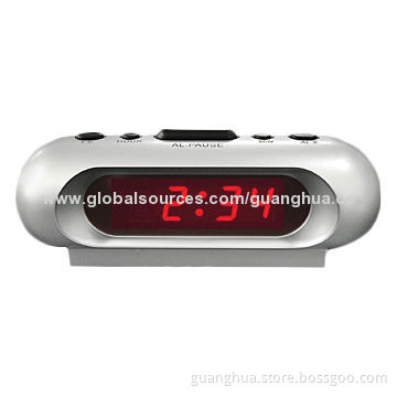2014 Shenzhen latest LED table alarm clock with power outlet